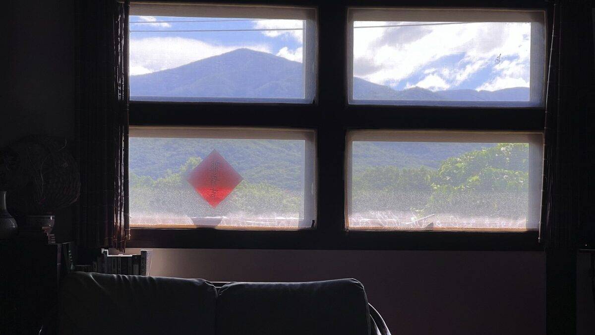 Mountain view through window